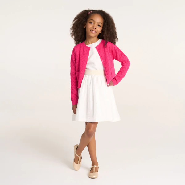 Gilet en maille pointelle rose Fille